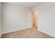 This bedroom has neutral carpet and an open door, showcasing the home's simple and clean design at 1816 Casein St, Summerville, SC 29483