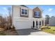 Two-story home with two car garage and traditional exterior siding with craftsman accents at 1816 Casein St, Summerville, SC 29483
