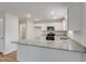 Modern kitchen with stainless steel appliances, granite countertops and white cabinetry at 1816 Casein St, Summerville, SC 29483