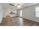 Open living area with a view into the modern kitchen with granite countertops at 1816 Casein St, Summerville, SC 29483