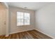 Office area features wood look floors, large window and white trim at 1816 Casein St, Summerville, SC 29483