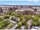 Aerial view featuring city buildings and quaint homes nestled among mature trees at 184 Ashley Ave, Charleston, SC 29403