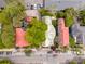 Aerial view of rooftops with trees and cars parked on the side of the street at 184 Ashley Ave, Charleston, SC 29403