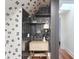 Chic bar area featuring open shelving, a decorative cabinet, and modern lighting at 184 Ashley Ave, Charleston, SC 29403