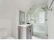 Modern bathroom with a glass-enclosed shower, sleek vanity, and elegant tile work at 184 Ashley Ave, Charleston, SC 29403