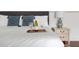 Relaxing bedroom showcasing a king bed with wine, decorative pillows, and stylish nightstand at 184 Ashley Ave, Charleston, SC 29403