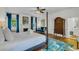Charming bedroom featuring a fireplace, hardwood floors, and classic decor at 184 Ashley Ave, Charleston, SC 29403