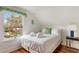 Cozy bedroom featuring a plush bed, bright window, and modern finishes at 184 Ashley Ave, Charleston, SC 29403