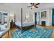 Inviting bedroom with hardwood floors, fireplace and elegant details at 184 Ashley Ave, Charleston, SC 29403