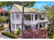 Stunning white home with a large balcony and intricate architectural details at 184 Ashley Ave, Charleston, SC 29403