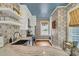 A stylish kitchen featuring stainless appliances, custom backsplash, and granite countertops at 184 Ashley Ave, Charleston, SC 29403