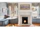 Stylish breakfast nook area with decorative wallpaper and window seats at 184 Ashley Ave, Charleston, SC 29403