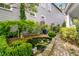 Picturesque pond with water lilies and lush greenery creates a serene garden space at 184 Ashley Ave, Charleston, SC 29403