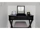 Elegant black vanity with makeup mirror, accent seat and plenty of room at 184 Ashley Ave, Charleston, SC 29403