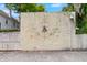 Exterior wall featuring a bee mural and lush green landscaping at 184 Ashley Ave, Charleston, SC 29403