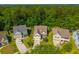 Aerial view of the neighborhood showcasing the home's location amidst lush greenery and well-maintained properties at 204 Black Gum Cir, Moncks Corner, SC 29461