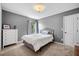 Comfortable bedroom with a full-size bed, dresser, and soft natural light at 204 Black Gum Cir, Moncks Corner, SC 29461