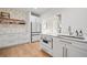 Well-designed kitchen with white cabinets, island and stainless steel appliances at 204 Black Gum Cir, Moncks Corner, SC 29461