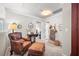 Cozy upstairs sitting area with leather chair, ottoman and decorative accents at 204 Black Gum Cir, Moncks Corner, SC 29461