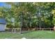 Backyard featuring a fenced in area and mature trees at 213 Factors Walk, Summerville, SC 29485