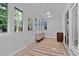 Sun room featuring floor-to-ceiling windows and sliding glass door at 213 Factors Walk, Summerville, SC 29485