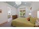 Bright bedroom with vaulted ceilings, hardwood floors, and natural light from many windows at 2187 Saint James Dr, Charleston, SC 29412