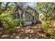 Rear exterior view of the house shows backyard space, including a partial view of the crawlspace at 2187 Saint James Dr, Charleston, SC 29412