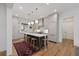 Bright kitchen featuring custom cabinets, marble countertops, and a functional kitchen island at 2187 Saint James Dr, Charleston, SC 29412