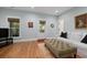 Comfortable living room with hardwood floors, soft blue walls, and a stylish ottoman at 2187 Saint James Dr, Charleston, SC 29412