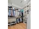 Spacious walk-in closet with custom shelves and ample storage for clothes, shoes, and accessories at 2187 Saint James Dr, Charleston, SC 29412