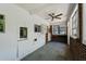 Enclosed back porch featuring brick detail and lots of natural light at 2234 River Rd, Johns Island, SC 29455