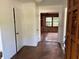 Inviting foyer with natural stone flooring leading to a bright and airy living space at 2331 Furman Dr, Charleston, SC 29414