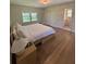 Serene main bedroom with a comfortable bed, soft lighting, and an ensuite bathroom at 2331 Furman Dr, Charleston, SC 29414