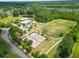 Aerial view showcasing community amenities, including a pool, park, and recreation areas at 236 Everwood Ct, Moncks Corner, SC 29461