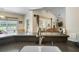 Contemporary kitchen with a granite countertop bar overlooking the living space at 236 Everwood Ct, Moncks Corner, SC 29461