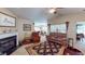 Inviting living room with a fireplace, plush seating, and an open layout perfect for gatherings at 236 Everwood Ct, Moncks Corner, SC 29461