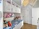 Fun ' bedroom featuring a built-in bunk bed, charming decor, and playful lighting at 2524 Josiah St, Charleston, SC 29492