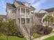 Two-story home featuring double porches and landscaped front yard at 2524 Josiah St, Charleston, SC 29492