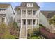 Charming two-story home with double porches and landscaped front yard at 2524 Josiah St, Charleston, SC 29492