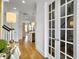 Open foyer featuring hardwood floors and modern lighting fixtures at 2524 Josiah St, Charleston, SC 29492
