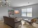 Comfortable living room with a stylish sofa, modern lighting, and wall-mounted TV at 2524 Josiah St, Charleston, SC 29492