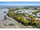 Stunning aerial view of a waterfront community with beautiful homes and lush greenery at 2538 Helmsman Rd, Johns Island, SC 29455