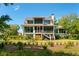 Spacious backyard with meticulously manicured lawn, ideal for outdoor activities and relaxation at 2538 Helmsman Rd, Johns Island, SC 29455