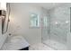 Bathroom with marble shower, vanity, and modern fixtures near a window at 2538 Helmsman Rd, Johns Island, SC 29455