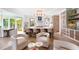 Elegant kitchen space features a large island with seating, marble details, and plenty of counter space for cooking prep at 2538 Helmsman Rd, Johns Island, SC 29455
