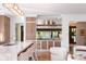 Stylish kitchen features an island with bar seating, custom cabinets, and a built-in bar area, perfect for modern living at 2538 Helmsman Rd, Johns Island, SC 29455