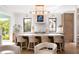 Spacious kitchen with a marble-topped island and counter seating, offering a modern, open layout for cooking and entertaining at 2538 Helmsman Rd, Johns Island, SC 29455