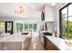 Open kitchen with marble island and water views at 2538 Helmsman Rd, Johns Island, SC 29455