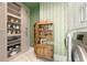Neat laundry room offering modern appliances, cabinetry, and storage at 2538 Helmsman Rd, Johns Island, SC 29455