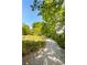 Inviting community path leads past lush greenery at 2538 Helmsman Rd, Johns Island, SC 29455